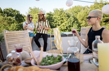 friends-at-festive-dinner-outdoors-2023-11-27-05-20-02-utc